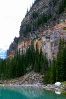 Climber in red above Lake Louise