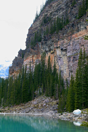 Climber in red above Lake Louise